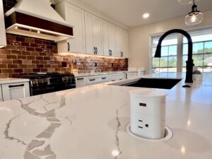 open concept kitchen remodel in Columbia Station with quartz countertops